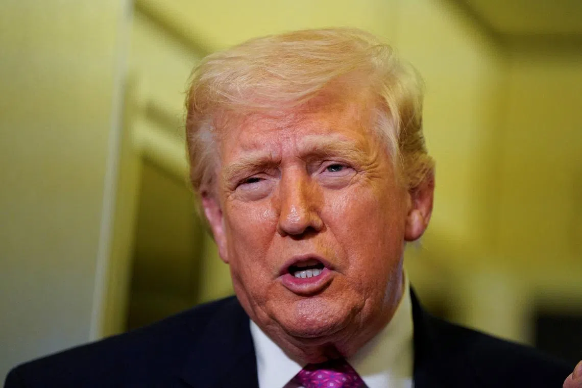 U.S. President Donald Trump talks to members of the media aboard Air Force One en route to Joint Base Andrews, Maryland, U.S., March 29, 2026. REUTERS/Elizabeth Frantz