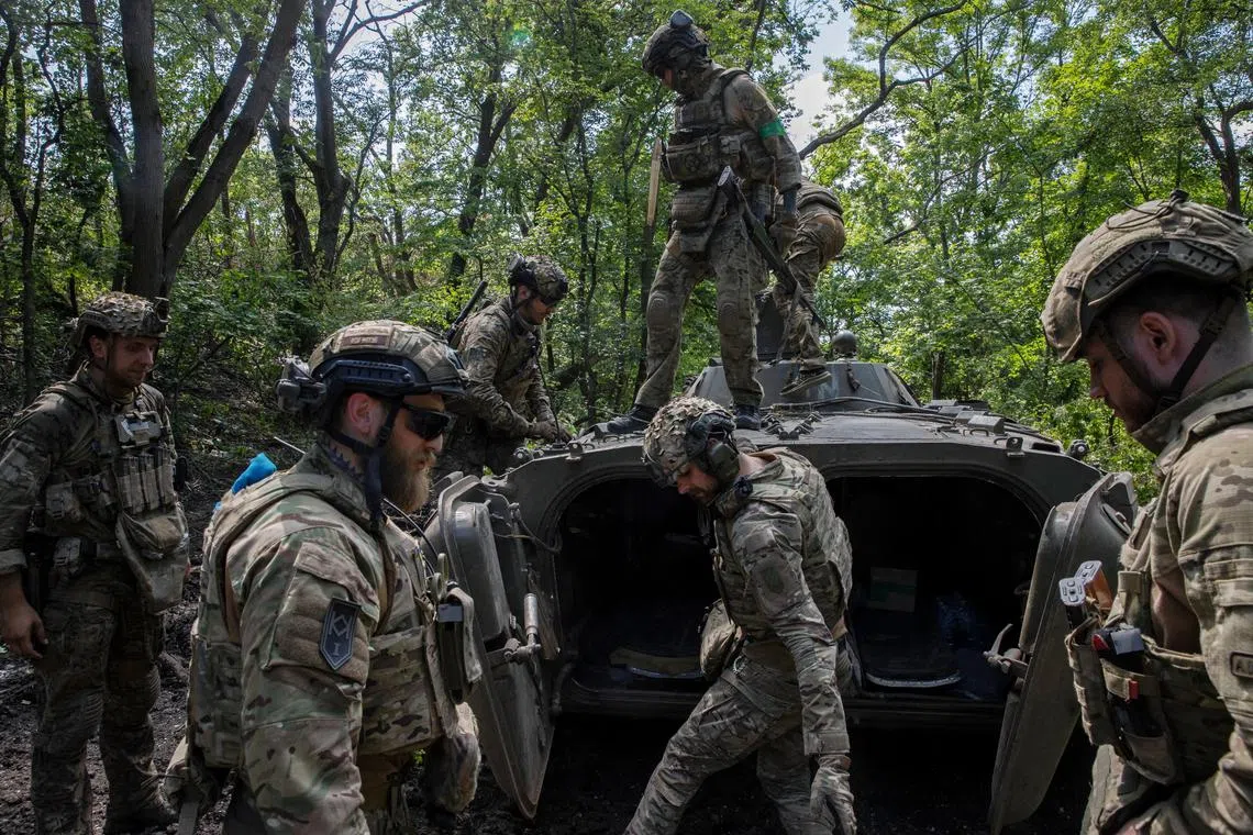 Ukrainian soldiers on the the front lines south of Bakhmut, Ukraine.