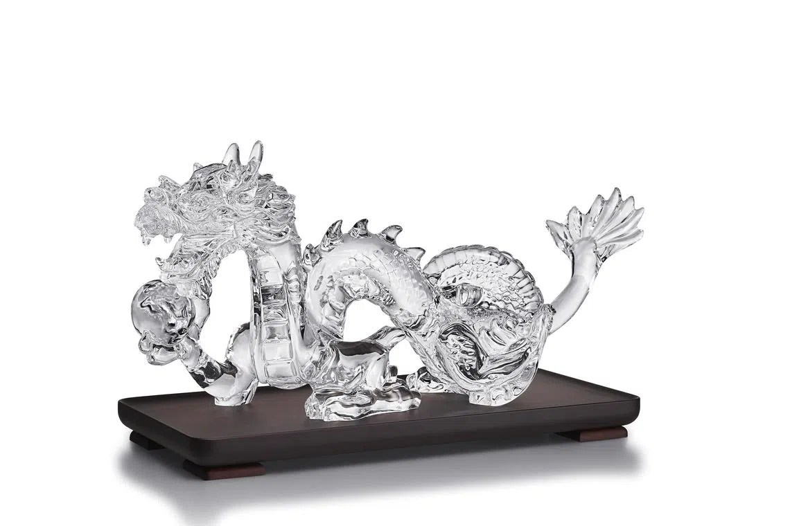 Baccarat's Dragon Legendaire ($67,000), which features the majestic creature on an ebony base. It is part of the brand's 2024 Dragon Year crystal collection.