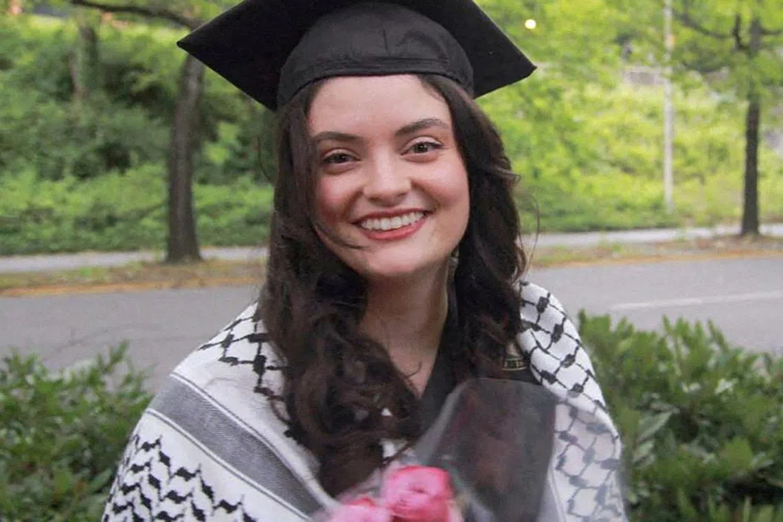 FILE PHOTO: Turkish-American woman Aysenur Ezgi Eygi, a graduate of the University of Washington, poses wearing her mortarboard and keffiyeh in a family photograph taken at the University of Washington's 2024 commencement ceremony, in Seattle, Washington, U.S,  June 8, 2024. International Solidarity Movement/Handout via REUTERS/File Photo