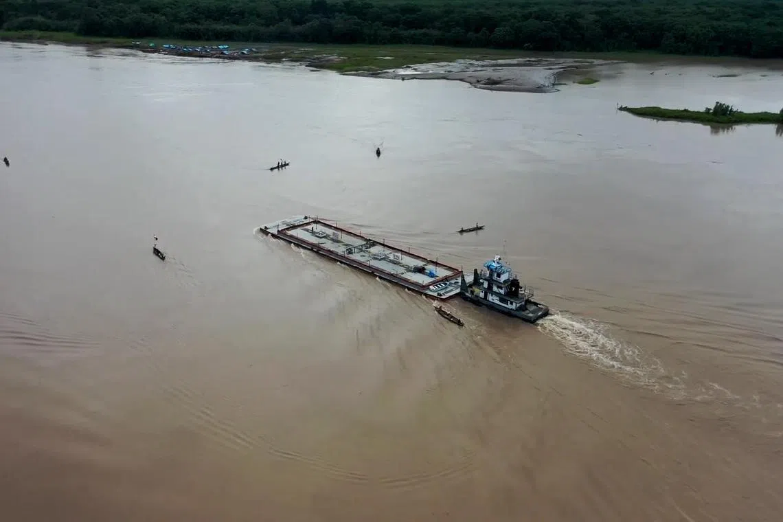 The indigenous protestors took over a barge transporting oil in an Amazon river in Peru on June 8.