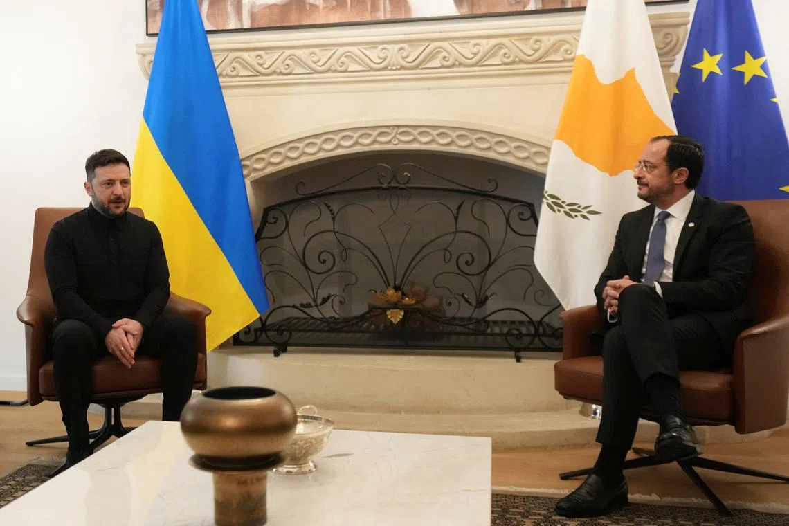 Ukrainian President Volodymyr Zelensky (left) meeting his Cypriot counterpart Nikos Christodoulides at the presidential palace in Nicosia on Jan 7.