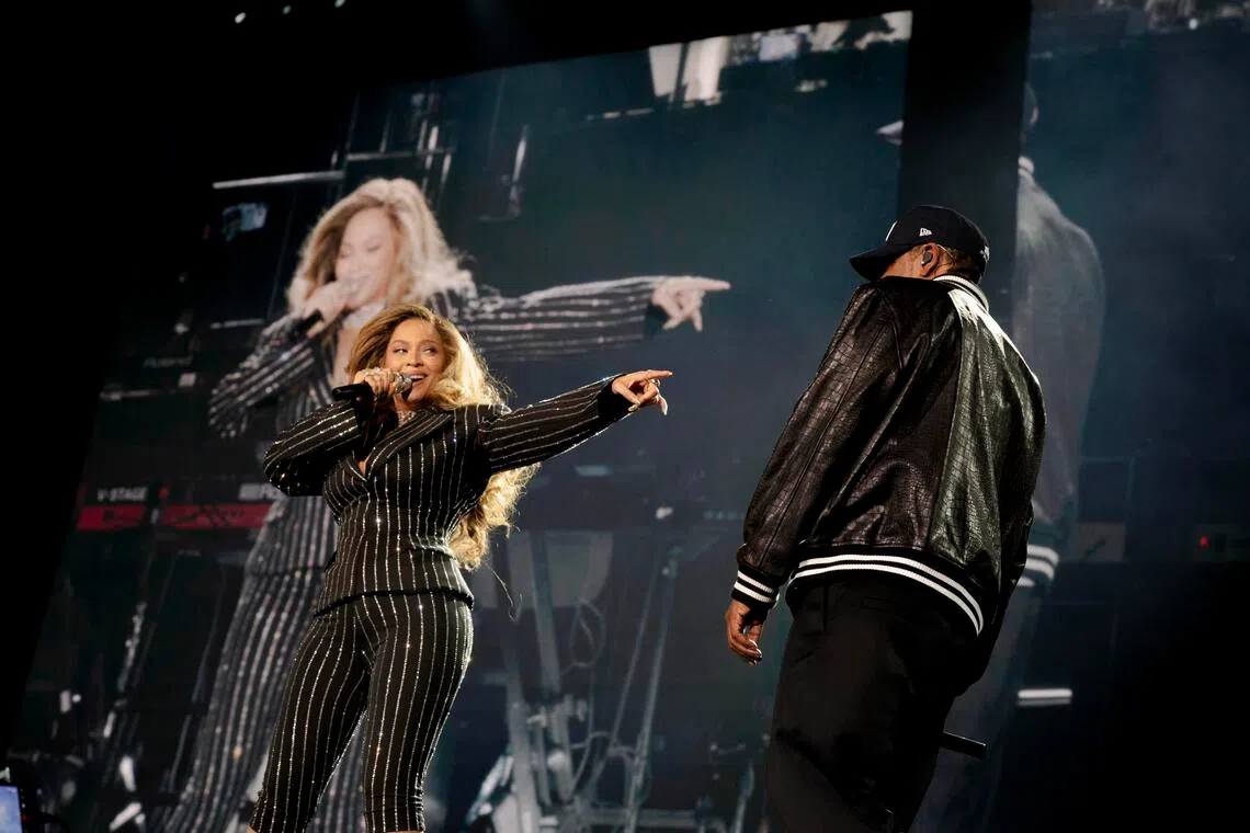 Beyonce performs with husband Jay-Z on the first night of his three-show series at Yankee Stadium in New York, July 10.
