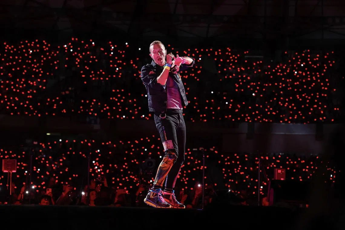 Coldplay's Chris Martin performs on stage during their Music of the Spheres world tour in Coimbra, Portugal.