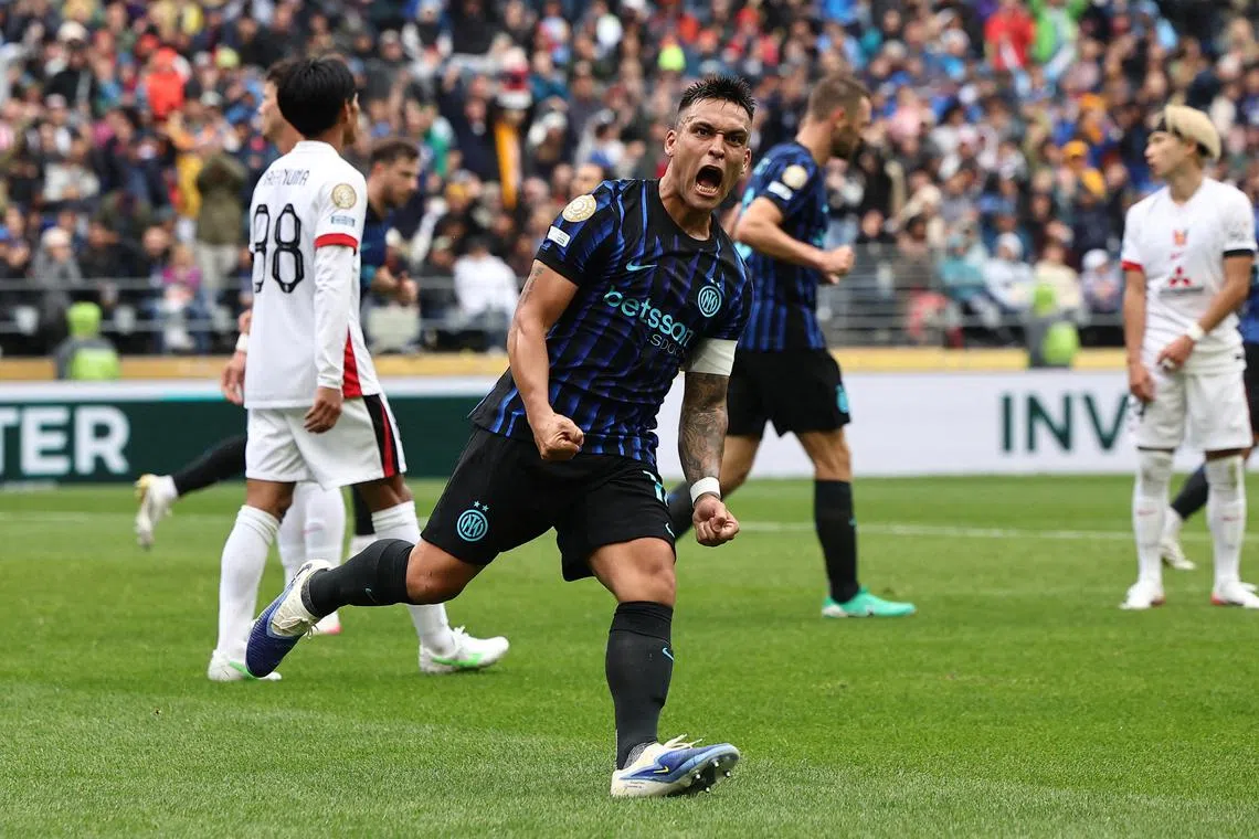 Inter Milan's Lautaro Martinez celebrates scoring their first goal. 