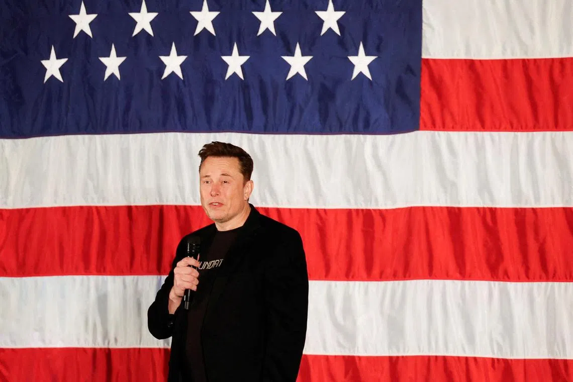 Tesla CEO and X owner Elon Musk, who supports Republican presidential nominee Donald Trump, speaks about voting during an America PAC Town Hall in Pennsylvania, US, on Oct 17, 2024.