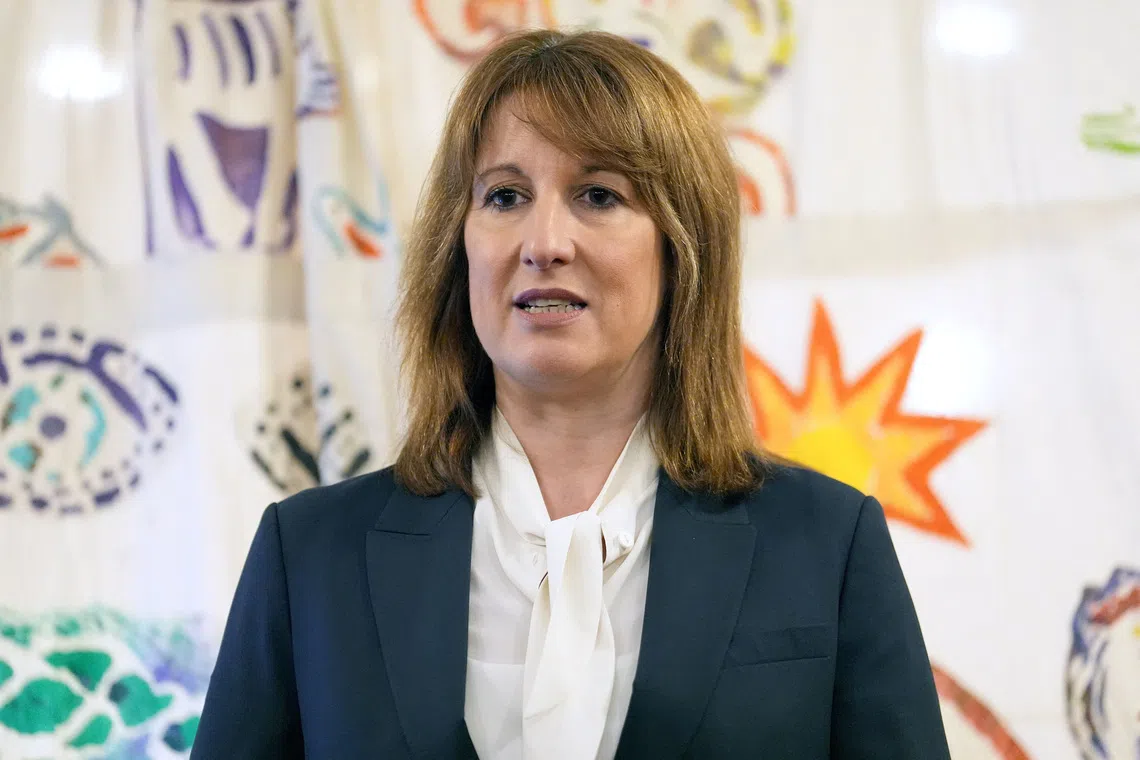 Chancellor of the Exchequer Rachel Reeves takes part in a town hall session at the Calthorpe Community Gardens, following the Monetary Policy Committee (MPC) announcement that interest rates will be cut from 4% to 3.75%, in London, Britain December 18, 2025.    Lucy North/Pool via REUTERS