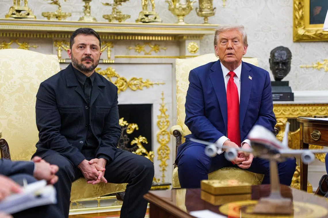 US President Donald J Trump (right) meeting Ukrainian President Volodymyr Zelensky in the Oval Office of the White House on Aug 18.