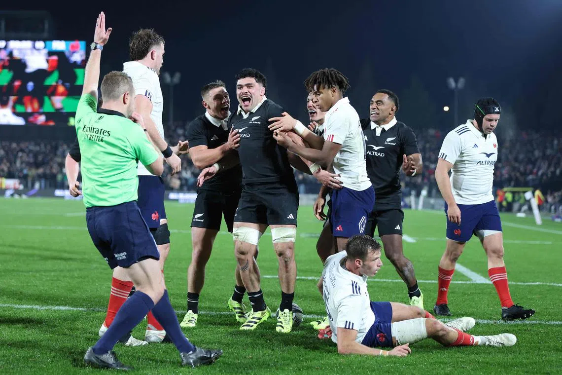 New Zealand's Du’Plessis Kirifi celebrates his try during the third international rugby Test match against France at FMG Stadium Waikato in Hamilton on July 19, 2025.