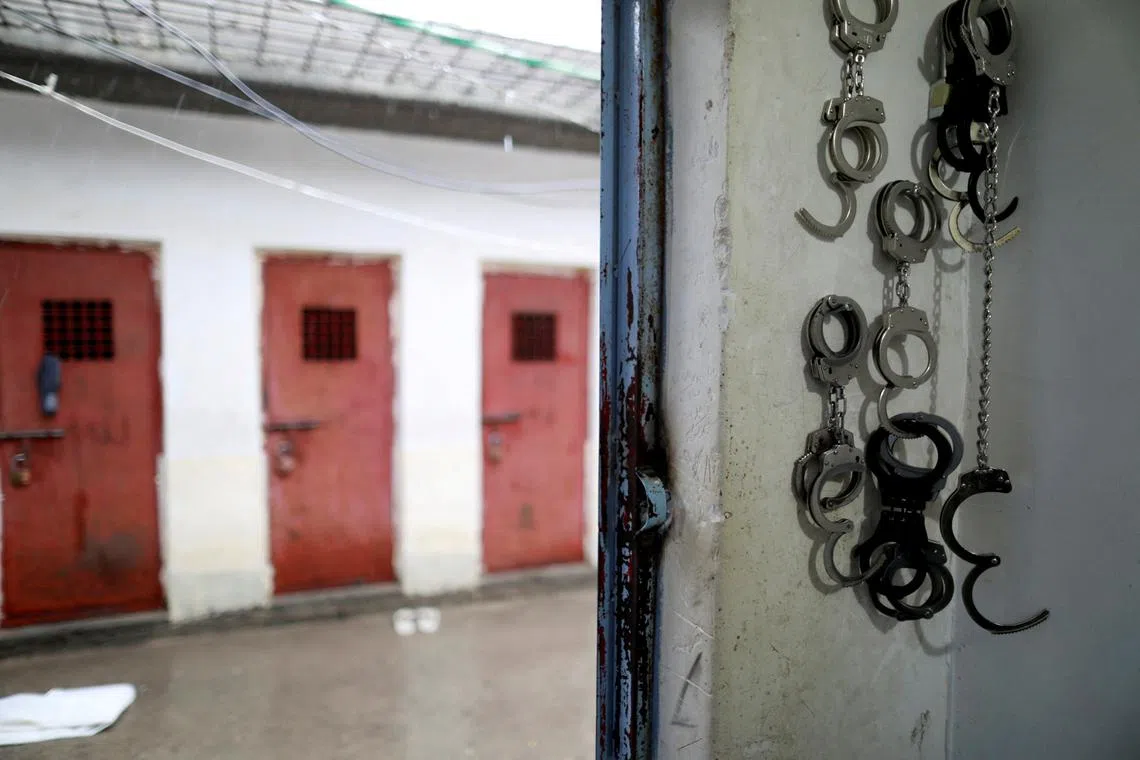 FILE PHOTO: Cuffs are seen in front of cells housing Islamic state members at a counter-terrorism prison in Sulaimaniya, Iraq, February 15, 2017. REUTERS/Zohra Bensemra/File Photo