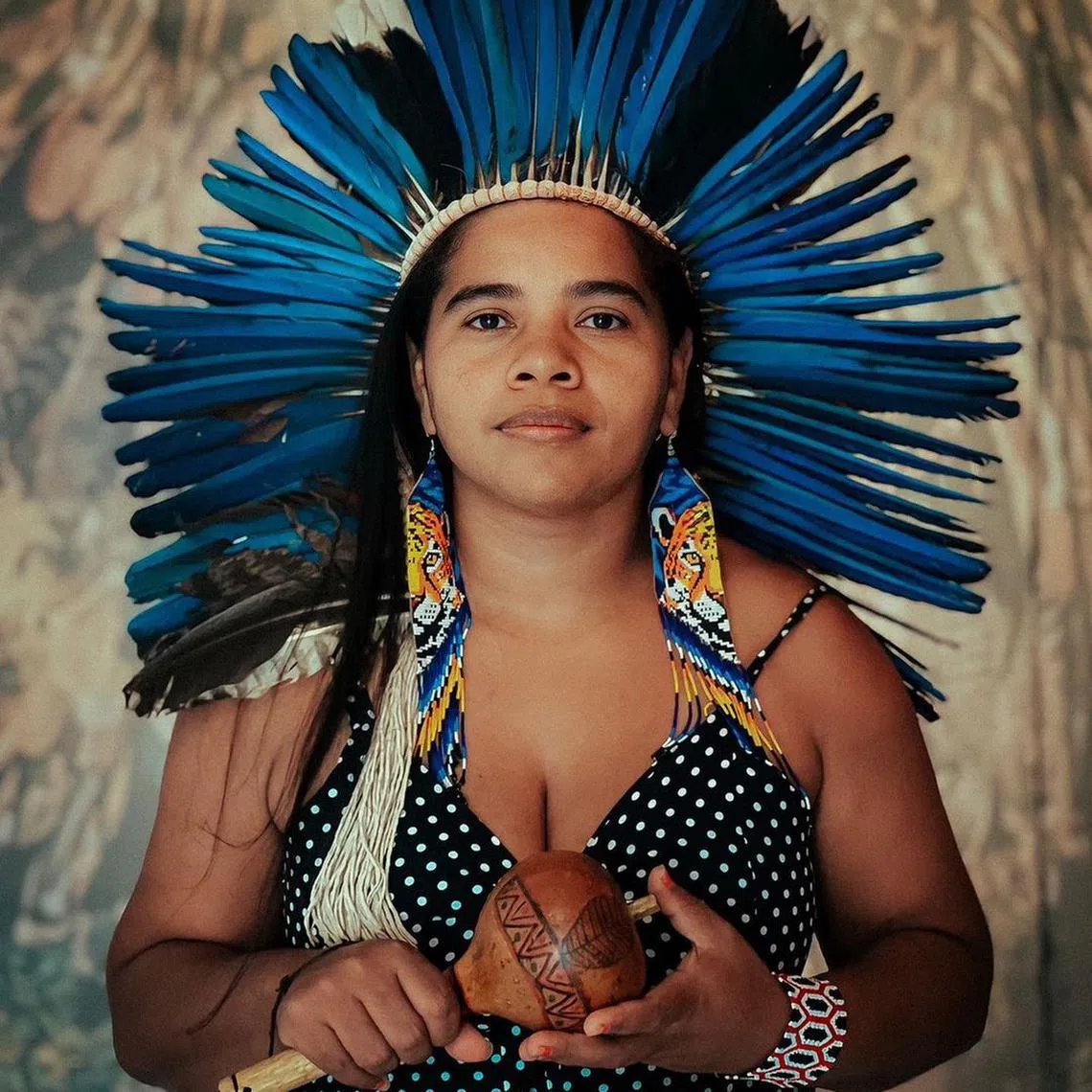 Indigenous Brazilian artist Gliceria Tupinamba is exhibiting an intricate, multicoloured mantle at the Venice Biennale. 