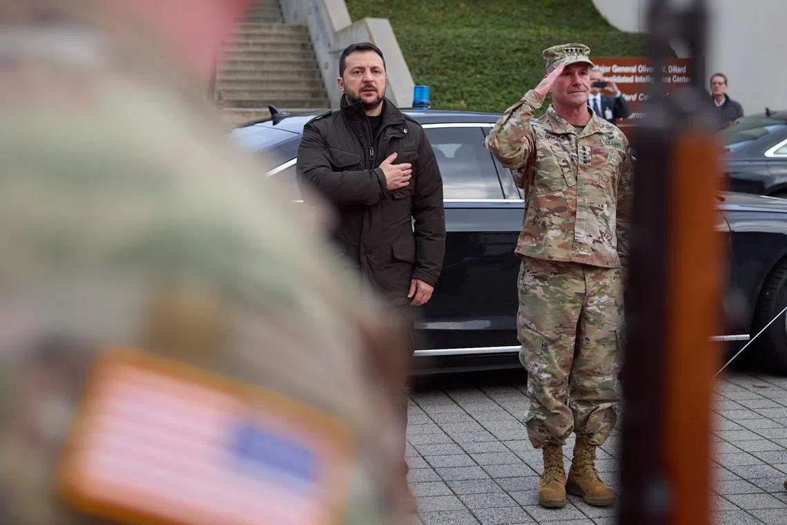 Ukrainian President Volodymyr Zelensky (left) visiting the headquarters of the US Army Command in Europe and Africa in Wiesbaden, Germany, in Dec 14, 2023.