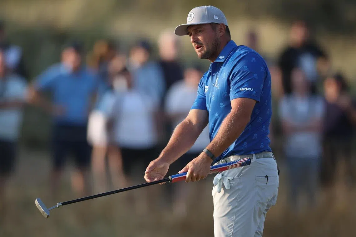 Bryson DeChambeau suffered a two-stroke penalty after R&A officials deemed he had inadvertently improved the area of his intended swing on the fifth hole in the British Open second round.