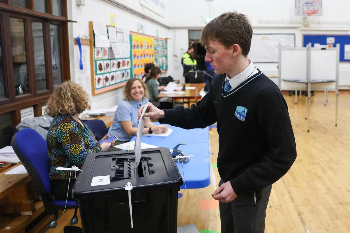A man cast his vote at a polling station in Delgany, Ireland.