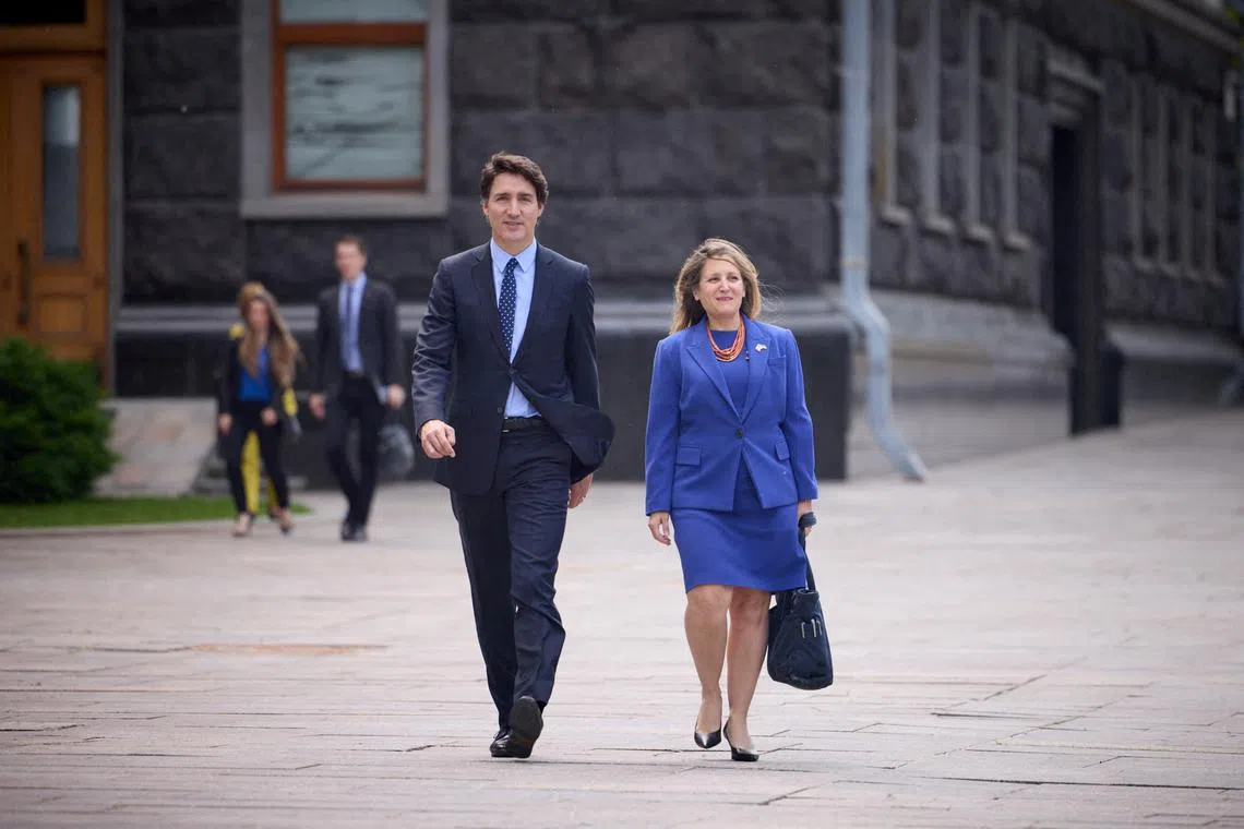 FILE PHOTO: Canadian Prime Minister Justin Trudeau, accompanied by Canada's Minister of Finance Chrystia Freeland arrive for a meeting with Ukraine's President Volodymyr Zelenskiy, amid Russia's attack on Ukraine, in Kyiv, Ukraine June 10, 2023. Ukrainian Presidential Press Service/Handout via REUTERS/File Photo