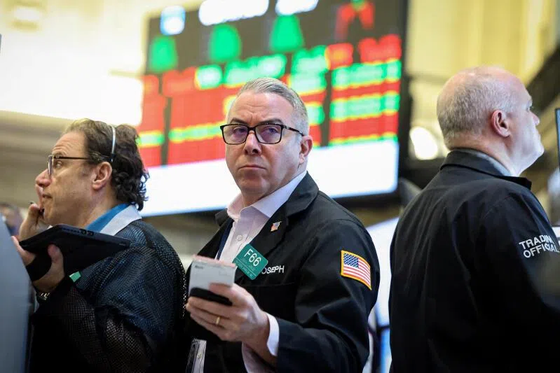 Futures-options traders work on the floor at the New York Stock Exchange's NYSE American (AMEX) in New York City, on April 27.