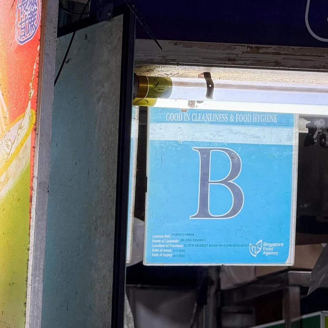 SFA food hygiene grading posters with ?A? and ?B?grades at food stalls stall at People?s Park Food Centre on Jan 7, 2026.