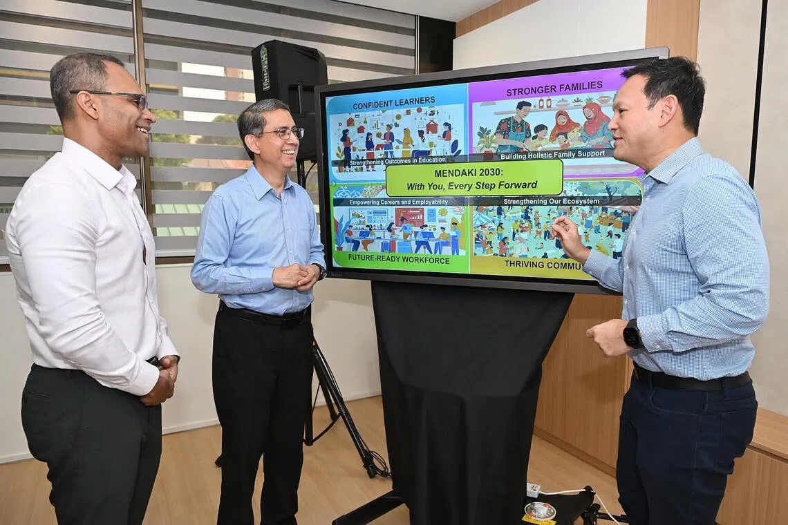 (From left) Mendaki chief executive Feroz Akber, Acting Minister-in-charge of Muslim Affairs Faishal Ibrahim and Senior Minister of State for Defence Zaqy Mohamad, showing the group’s five-year work plan to strengthen educational support, expand outreach and deepen partnerships, on Jan 15.