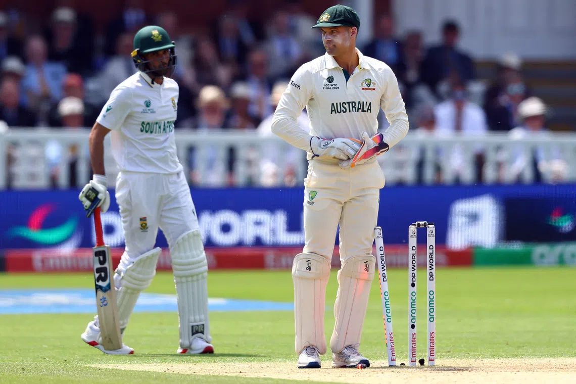 Cricket - 2025 ICC World Test Championship Final - South Africa v Australia - Lord's Cricket Ground, London, Britain - June 12, 2025 Australia's Alex Carey awaits for the third umpire review after taking a throw from Travis Head to run out South Africa's Keshav Maharaj Action Images via Reuters/Andrew Boyers