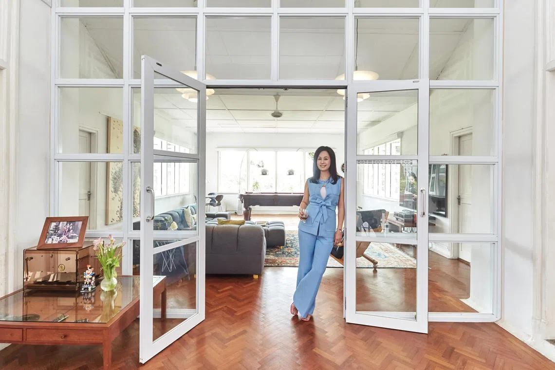 hblynette03 - Lynette Wong, owner of furniture gallery 1B2G Important Design, in her sprawling black and white colonial house.

Credit: Lawrence Teo