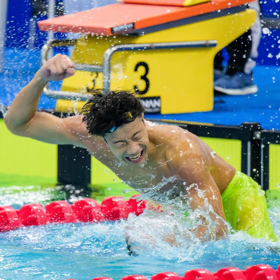 Singaporean swimmer Tedd Chan celebrating after winning the boys' 50m backstroke gold at the Asian Youth Games in Bahrain on Oct 28. 