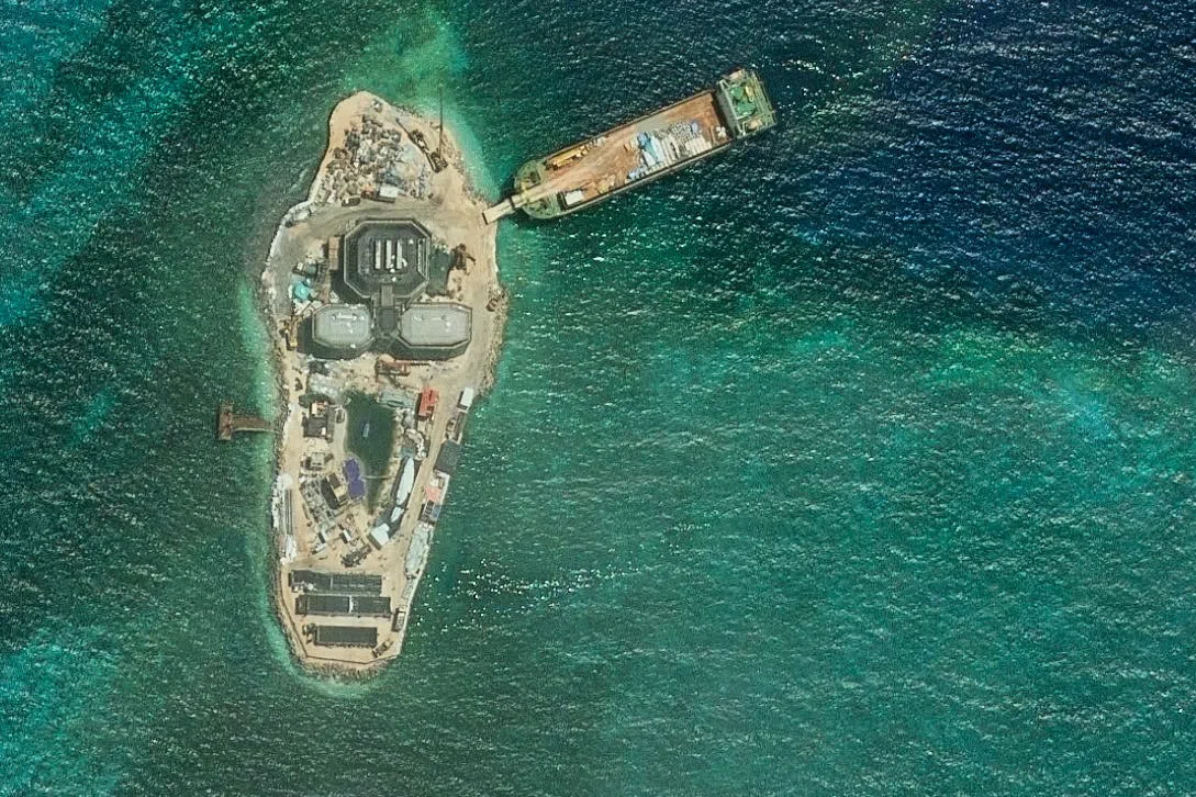 Analysts say China could be building a radar facility on Yagong Reef to support a base it is building on Antelope Reef.