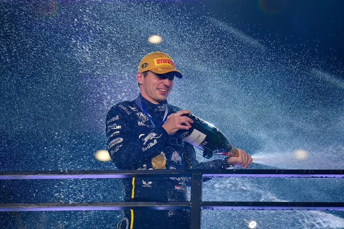 Red Bull driver Max Verstappen celebrates his victory at the Las Vegas Grand Prix.