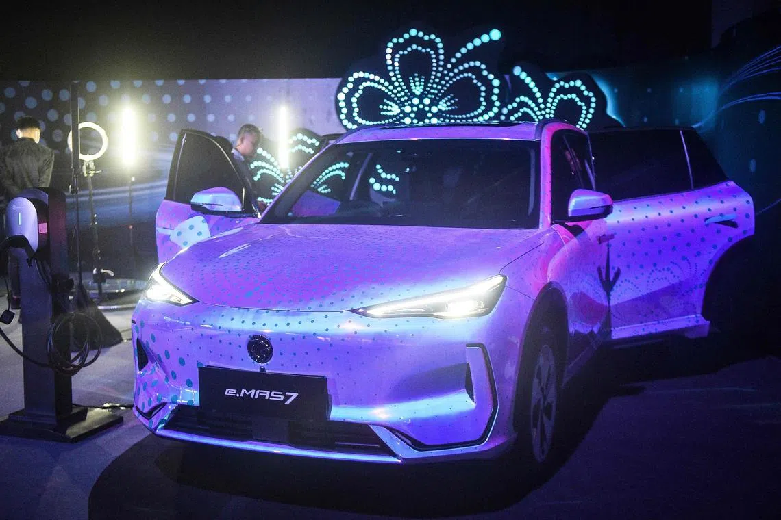 Malaysia first locally produced electric vehicle (EV), the e.MAS 7, is seen during its launch event at Malaysia International Trade and Exhibition Centre (MITEC) in Kuala Lumpur on Dec 16, 2024.