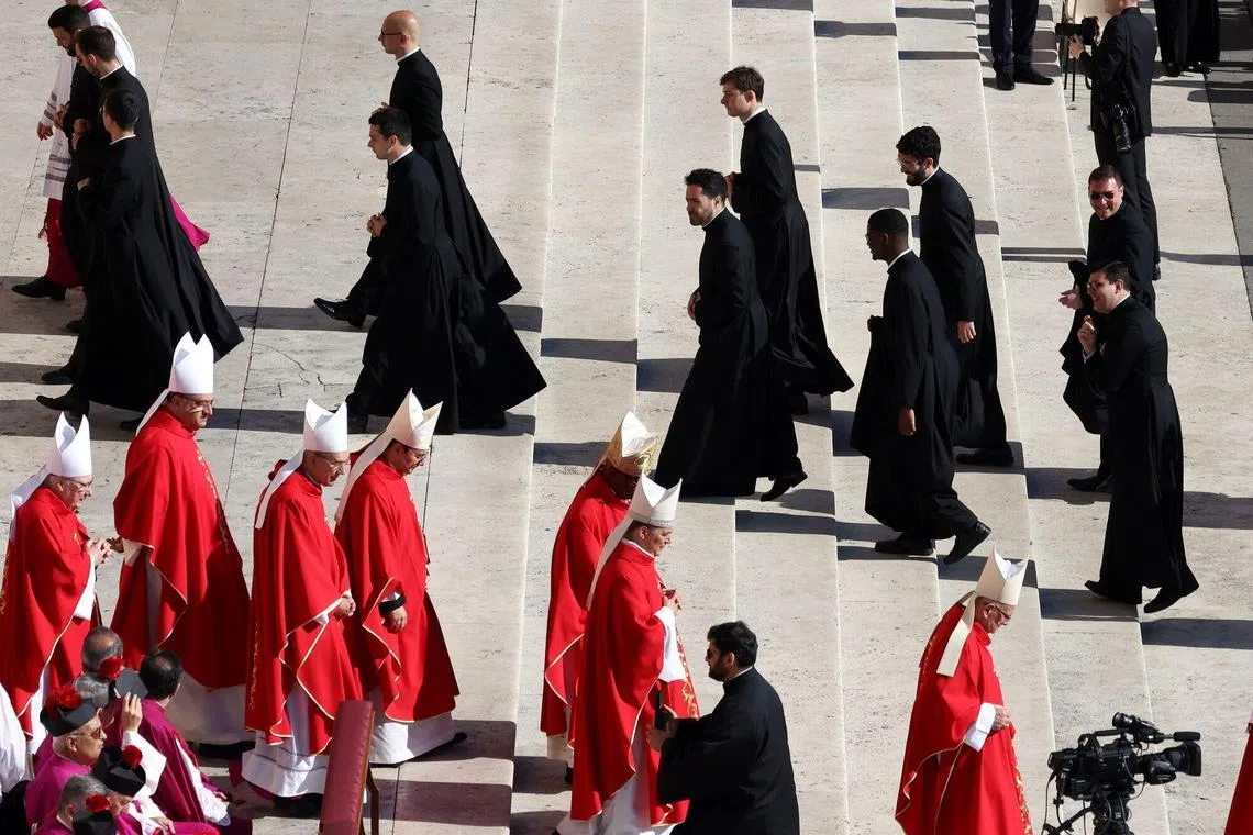 Bishops and priests arriving for the funeral of Pope Francis in St. Peters Square in Vatican City, on Saturday, April 26, 2025. Global leaders paid tribute to the late Pope Francis, highlighting his role in key global conflicts at a time of heightened geopolitical tensions. 