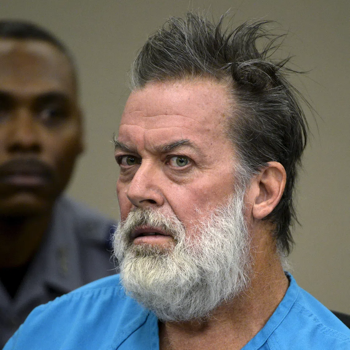 Robert Lewis Dear, 57, accused of shooting three people to death and wounding nine others at a Planned Parenthood clinic in Colorado last month, attends his hearing to face 179 counts of various criminal charges at an El Paso County court in Colorado Springs, Colorado December 9, 2015. REUTERS/Andy Cross/Pool