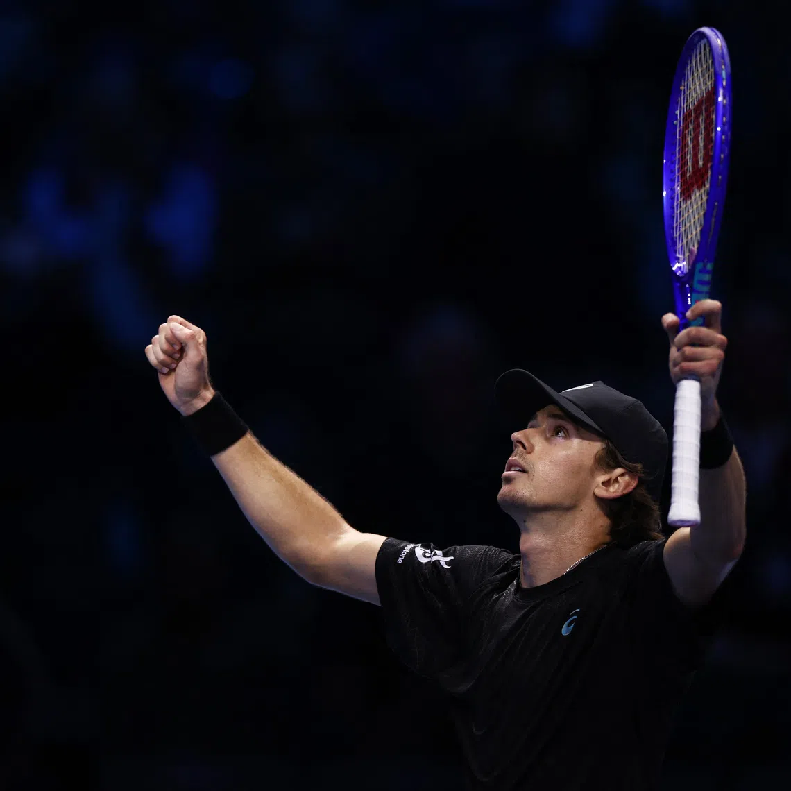 Tennis - ATP Finals - Turin - Palasport Olimpico, Turin, Italy - November 13, 2025 Australia's Alex de Minaur celebrates winning his group stage match against Taylor Fritz of the U.S. REUTERS/Guglielmo Mangiapane