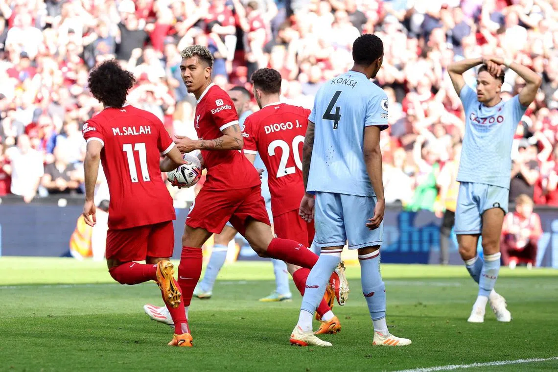 Liverpool's Roberto Firmino celebrates after scoring in the 1-1 draw against Aston Villa.