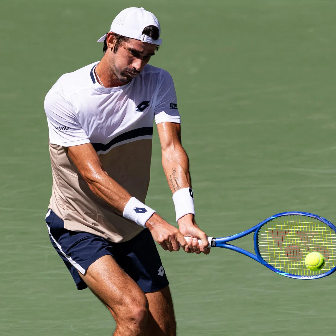 Aug 27, 2025; Flushing, NY, USA; Lloyd Harris of South Africa in action against Taylor Fritz of the United States in the second round of the men’s singles at the US Open at Louis Armstrong Stadium in Billie Jean King National Tennis Center. Mandatory Credit: Mike Frey-Imagn Images