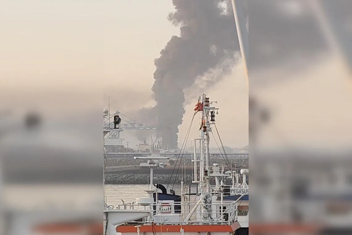 A screengrab from a social media video shows smoke billowing from the Fujairah oil industry zone, in Fujairah, United Arab Emirates.