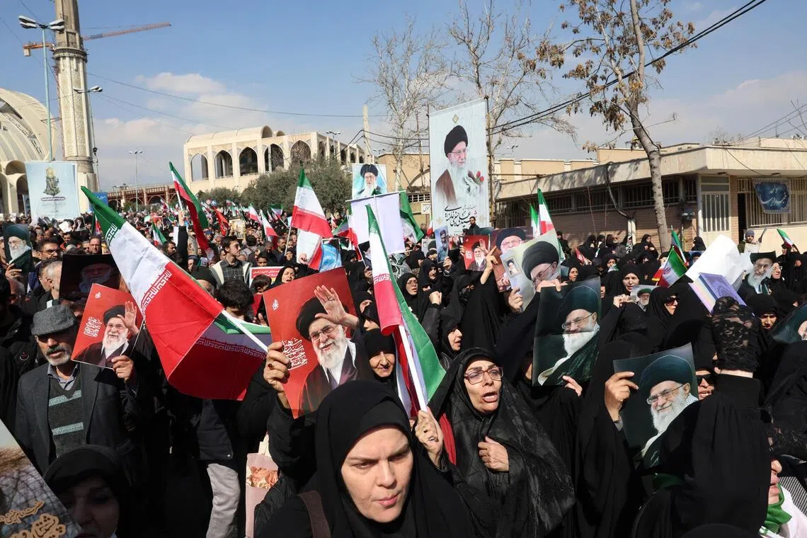 Supporters of Iran's slain supreme leader Ayatollah Ali Khamenei stage a protest after Friday prayers in Tehran on March 6, 2026. 
