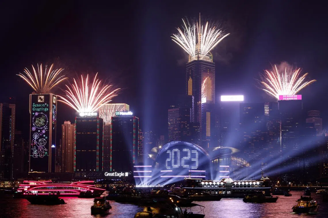 Hong Kong celebrates New Year with pyrotechnics over Victoria Harbour on Jan 1, 2023. 