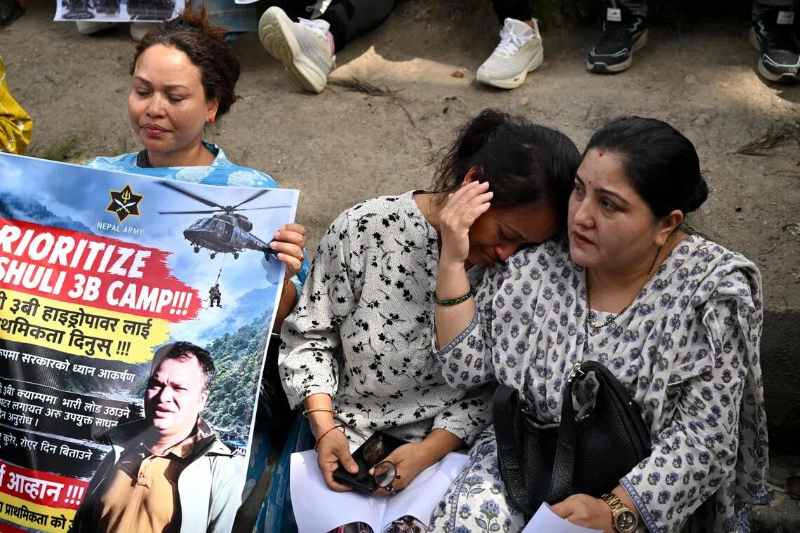 Families of those still missing in Nepal’s hydropower tunnels want rescuers to work faster