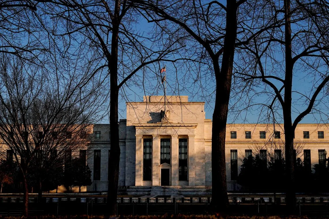 The US Fed keeps interest rates steady, but turns gloomier about the economy.
