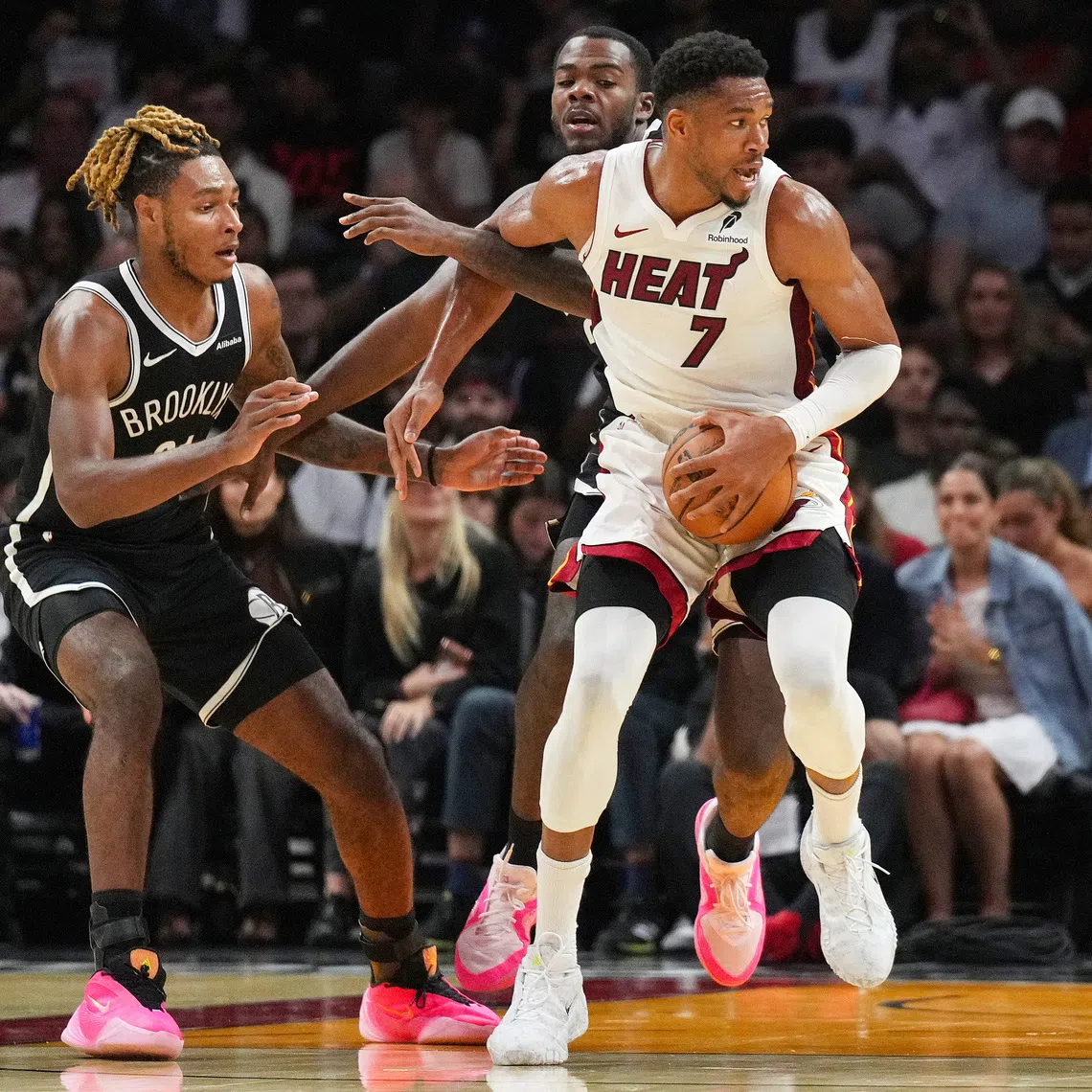 Miami Heat forward Giannis Antetokounmpo (in white) recorded 20 points, 15 rebounds and nine assists in just 23 minutes.