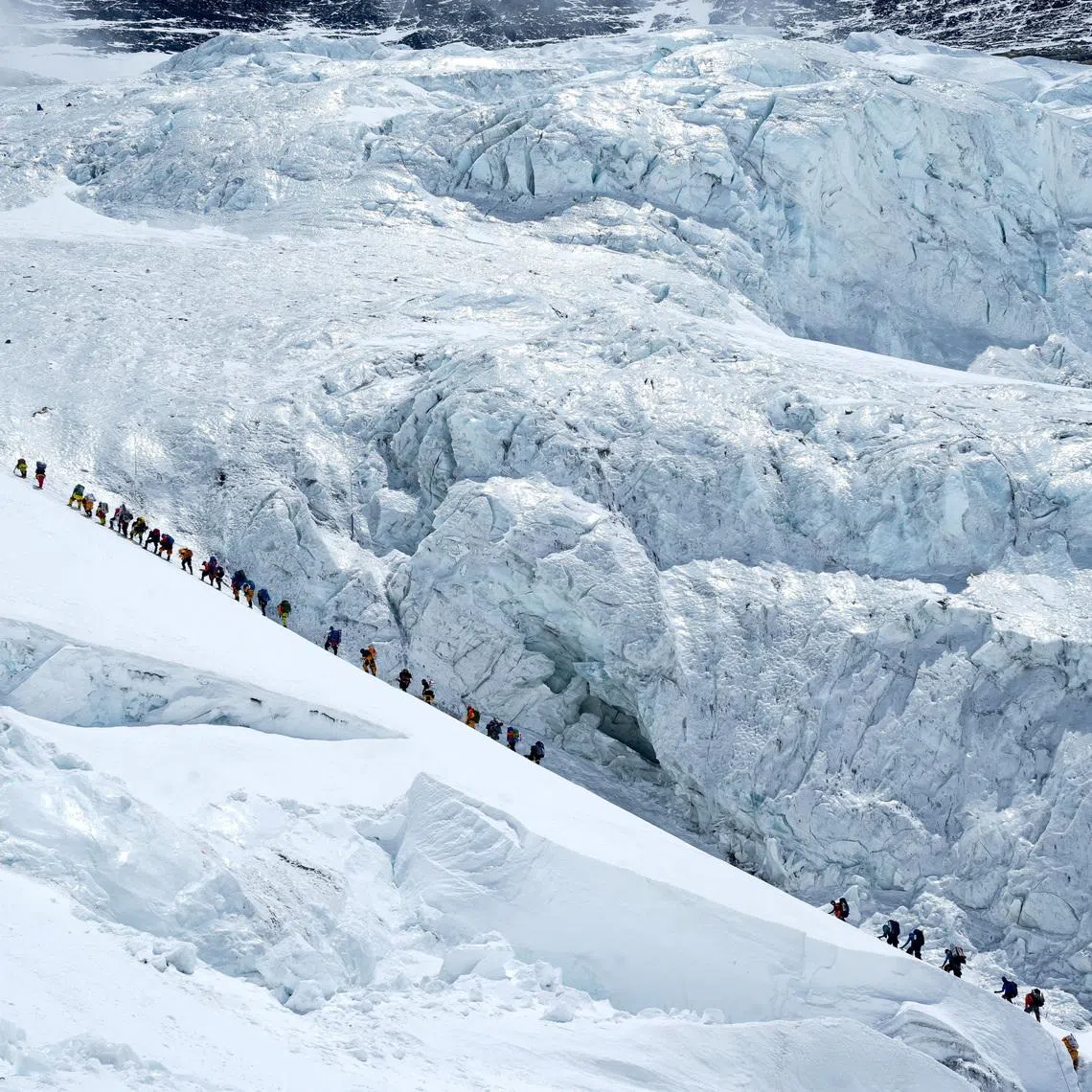 Climbers walking in a long queue as they head to summit Mount Everest in the Solukhumbu district, also known as the Everest region, Nepal on May 18, 2026. 