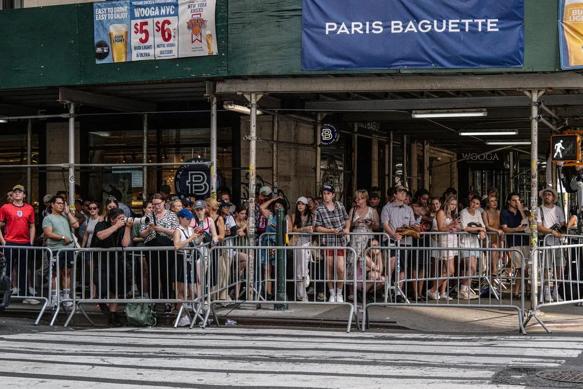 Taylor Swift fans, known as ‘Swifties,’ wait outside Madison Square Garden hoping to catch a glimpse of the singer on July 3.