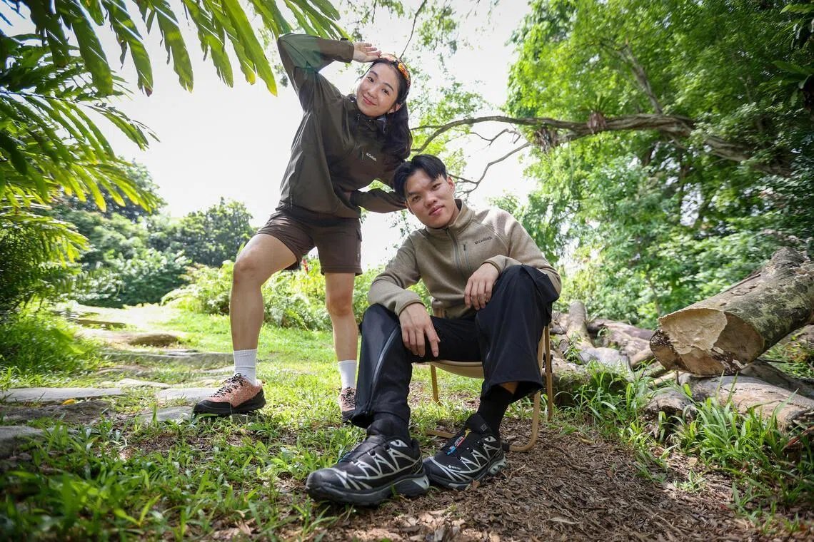 Goliath Outdoor co-founders Maribelle Su and Kenneth Wong, wearing the Trail Flex Convertible Pants; Su is wearing the Stormshield Ultralight jacket, while Wong is wearing the Core Comfort Fleece jacket.