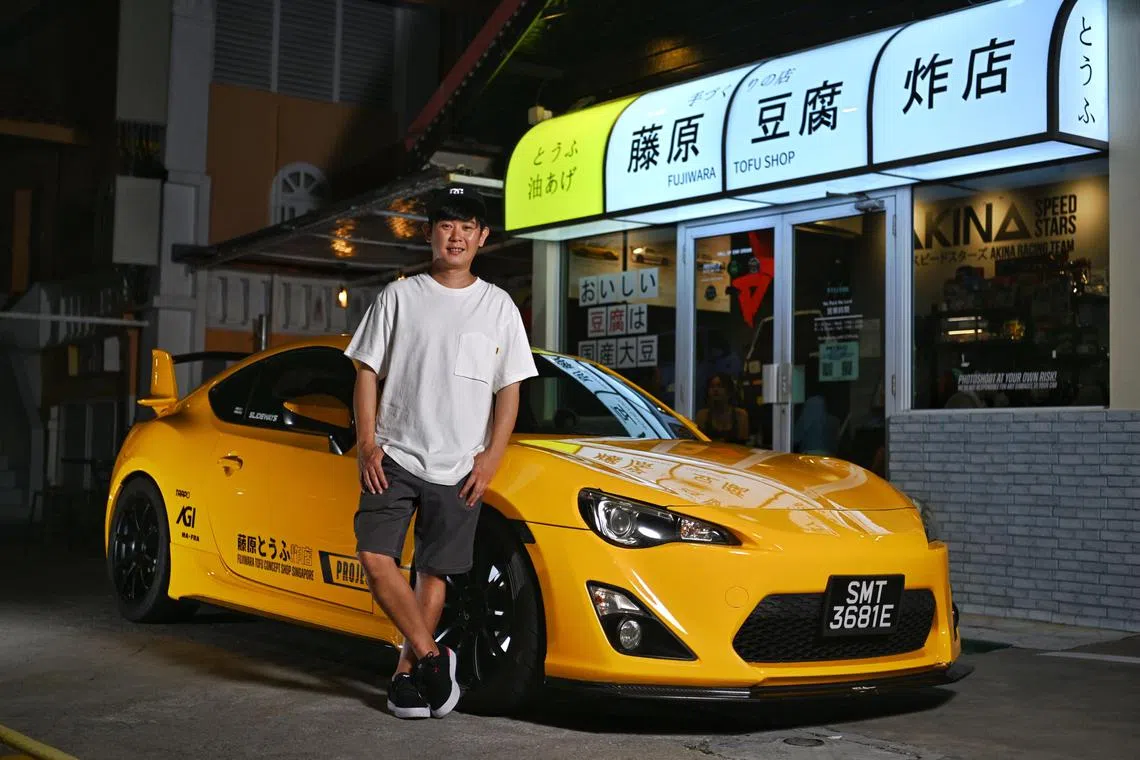 Charwin Tan with his Subaru BRZ photographed at his Initial D themed bistro, Fujiwara Tofu Concept Shop on November 15, 2023 ******** Me and my car series - Charwin Tan and his Subaru BRZ