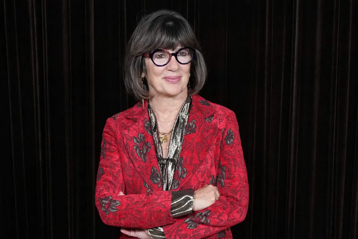 British-Iranian journalist Christiane Amanpour poses upon arrival to attend The Albies hosted by The Clooney Foundation of Justice at the Natural History Museum in London on Oct 9.