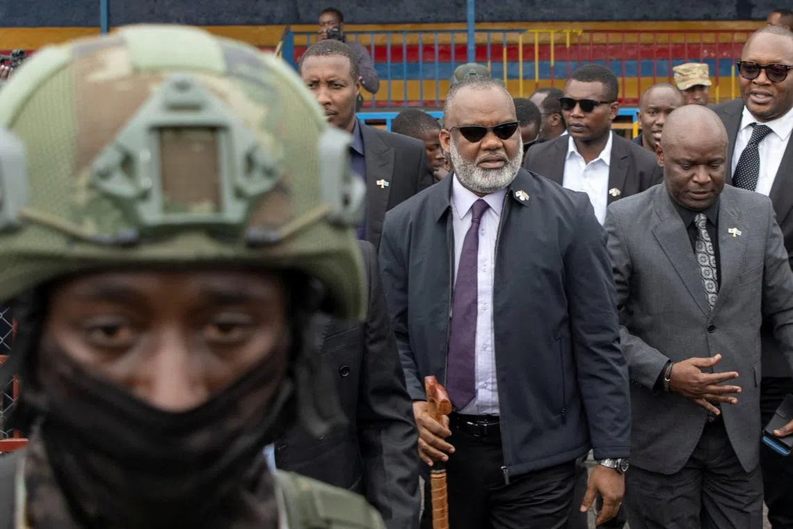 Corneille Nangaa, coordinator of the Alliance Fleuve Congo AFC/M23, arrives at Unity Stadium with rebel leaders for a funeral ceremony for victims who died in a drone strike in Masisi territory, in Goma, North Kivu province, Democratic Republic of Congo, January 8, 2026. REUTERS/Arlette Bashizi