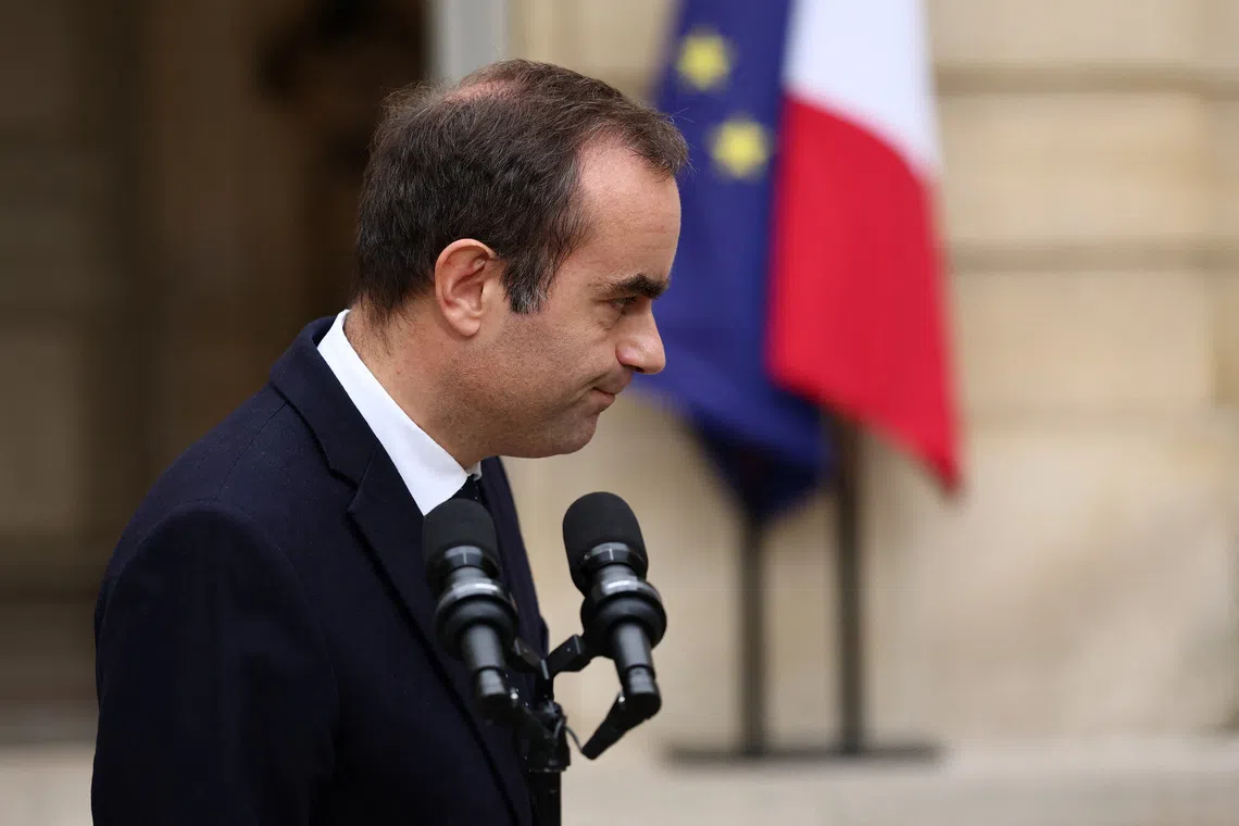 French outgoing Prime Minister Sebastien Lecornu, who presented his government's resignation to the French president this morning, reacts after delivering a statement at the Hotel Matignon in Paris, France, October 6, 2025. REUTERS/Stephane Mahe/Pool