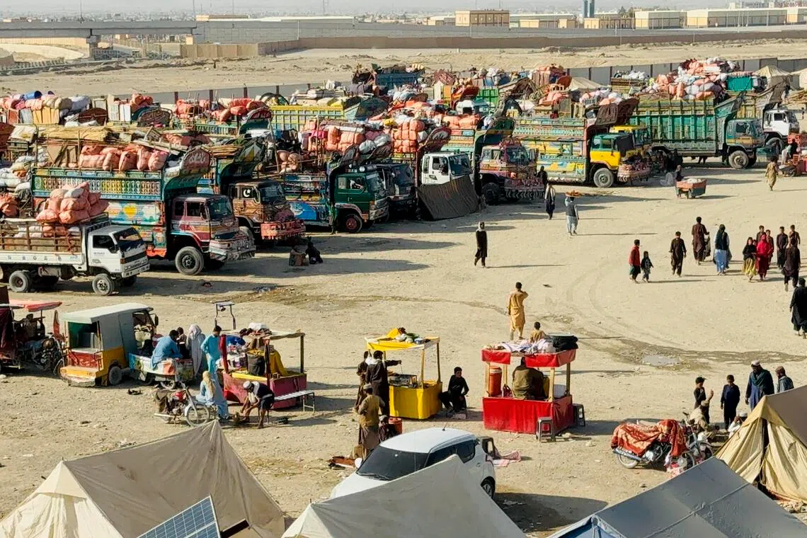 Afghan refugees prepare to return to Afghanistan at the border in Chaman, Pakistan on Oct 26.