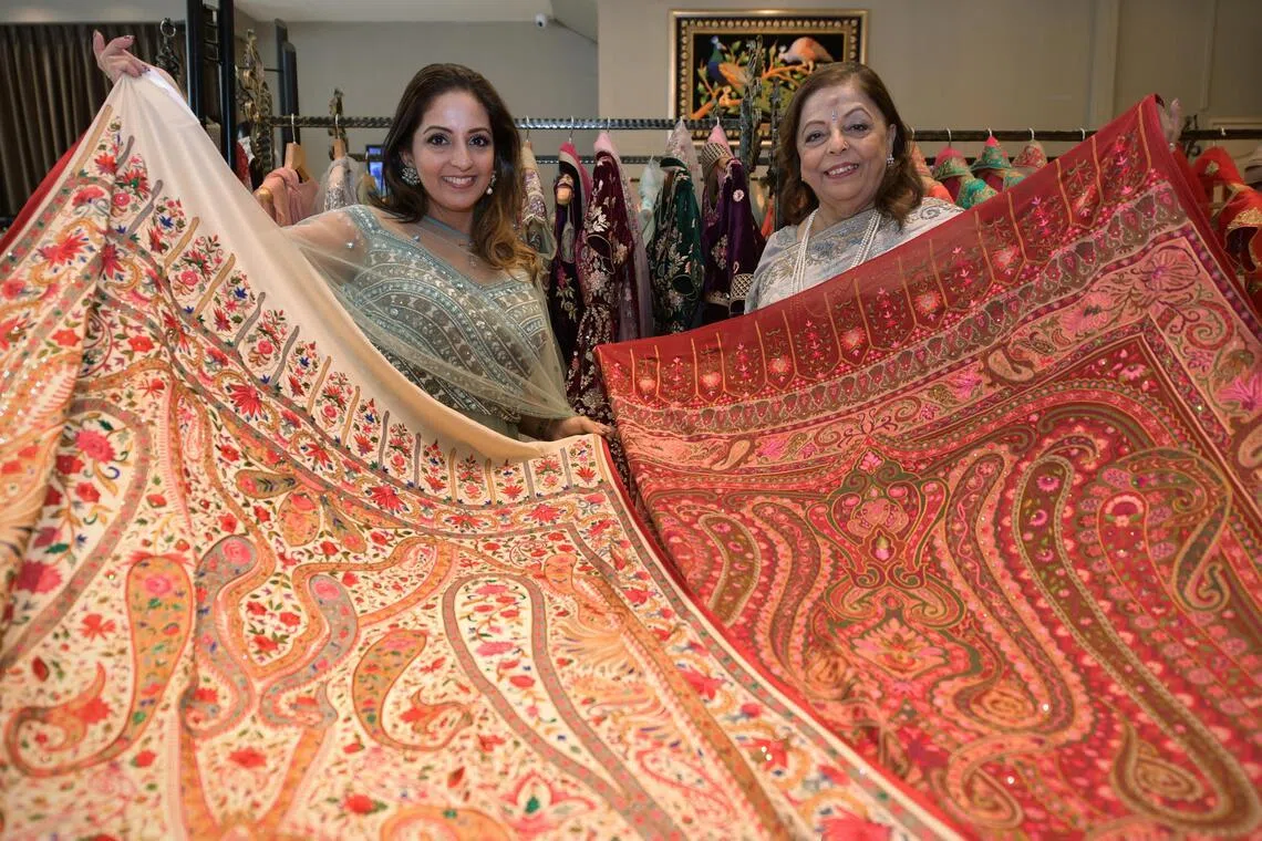 Stylemart managing director and fashion designer Kavita Thulasida and her mother, Madam Huri Baxani. 