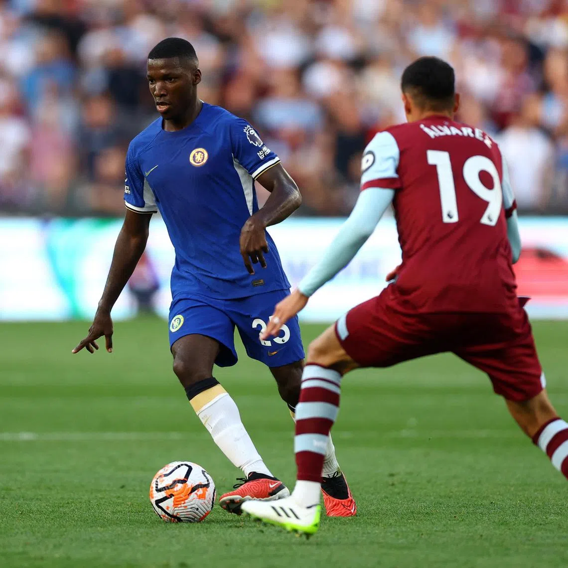 Chelsea's Moises Caicedo in action against West Ham United's Edson Alvarez.