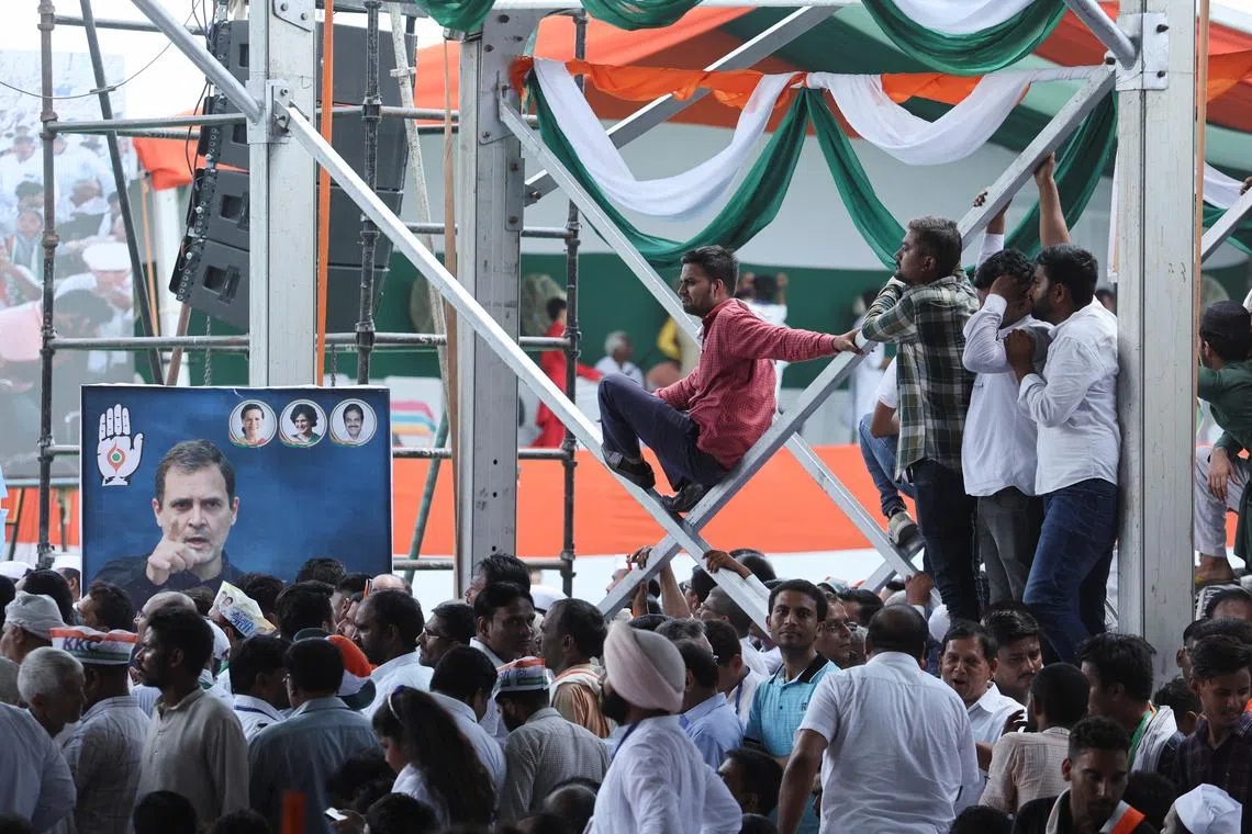 FILE PHOTO: People attend a massive rally organised by India's main opposition Congress party against inflation, at Ramlila Ground, in New Delhi, India, September 4, 2022. REUTERS/Anushree Fadnavis/File Photo